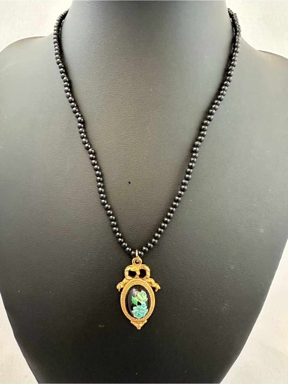 1928 Gold-Tone Cameo Pendant Necklace with Black Bead Chain Blue Roses